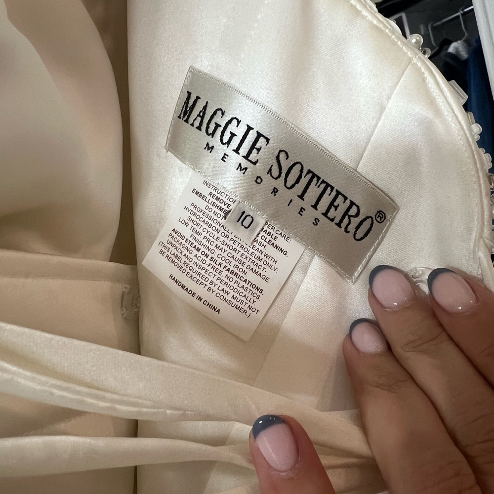 Maggie Sottero Elegant Strapless Wedding Gown - Picture 2 of 8